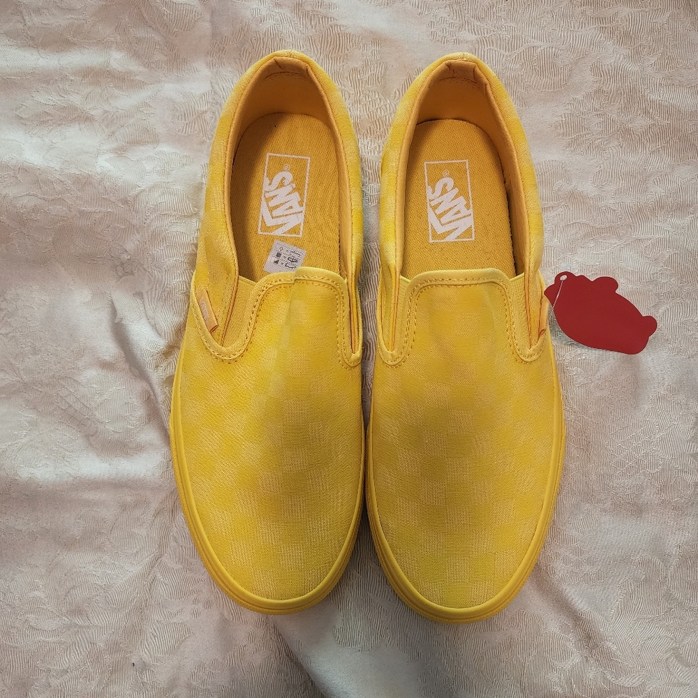 Vans slip on sneakers.